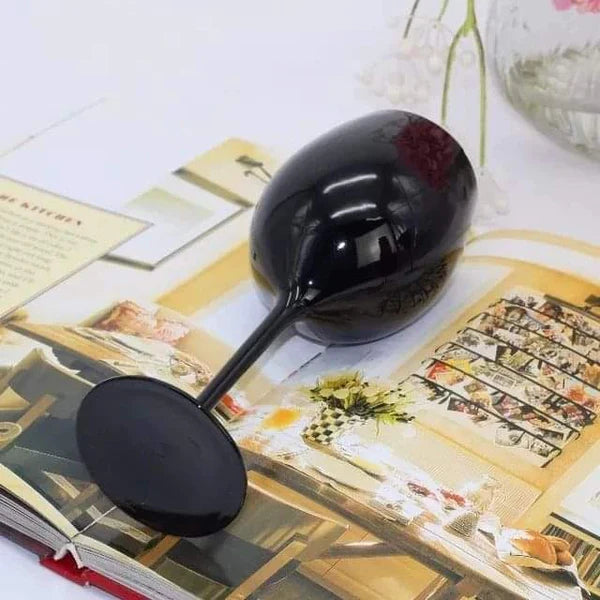 Black wine glasses — Kenya · WIMU Kitchen Nairobi