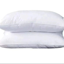 A pair of DFDC compressed comfy pillows — Kenya · WIMU Kitchen