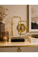 Gold Brass Skeleton Desktop Clock with Black Marble Base and Roman Numeral Dial — WIMU Kitchen Nairobi — Kenya · WIMU Kitchen