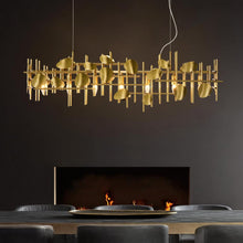 Linear sculptural Brass Grid Chandelier with Floating rods , Irregular Brass discs & hidden LED bulbs — Kenya · WIMU Kitchen