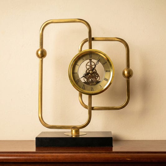 Gold Brass Skeleton Desktop Clock with Black Marble Base and Roman Numeral Dial — WIMU Kitchen Nairobi — Kenya · WIMU Kitchen Nairobi