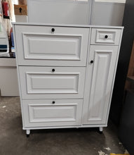 White Multilayer Shoe Cabinet with Black Round Handles and Raised Panel Detailing — WIMU Kitchen Nairobi — Kenya · WIMU Kitchen