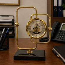 Gold Brass Skeleton Desktop Clock with Black Marble Base and Roman Numeral Dial — WIMU Kitchen Nairobi — Kenya · WIMU Kitchen