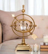 Antique Gold Armillary Sphere Sculpture with Crystal Ball Table Centerpiece — WIMU Kitchen Nairobi — Kenya · WIMU Kitchen