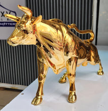 Golden Charging Bull Sculpture — Kenya · WIMU Kitchen