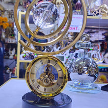 Gold Skeleton Table Clock with Crystal Sphere Armillary and Marble Base — WIMU Kitchen Nairobi — Kenya · WIMU Kitchen