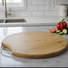 Round bamboo chopping and serving board with handle – side view — Kenya · WIMU Kitchen