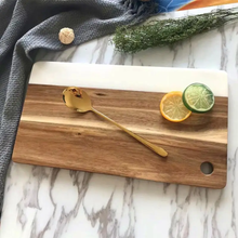 Acacia wood cutting and charcuterie board with marble stitch inlay – close-up — Kenya · WIMU Kitchen