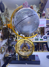 Atlasphere Skeleton Table Clock with Rotating Silver Globe and Marble Base — WIMU Kitchen Nairobi — Kenya · WIMU Kitchen