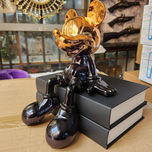 Sitting Mouse Character Statue with Glossy Chrome Black Finish and Gold Ear Accents — WIMU Kitchen Nairobi — Kenya · WIMU Kitchen