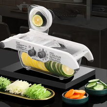 Multi-functional stainless steel grater and slicer – in use — Kenya · WIMU Kitchen